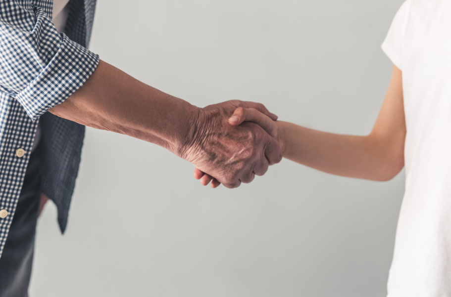 old-man-and-young-boy-shaking-hands